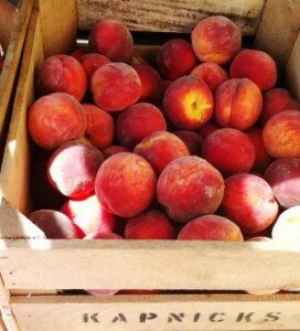 small crate peaches